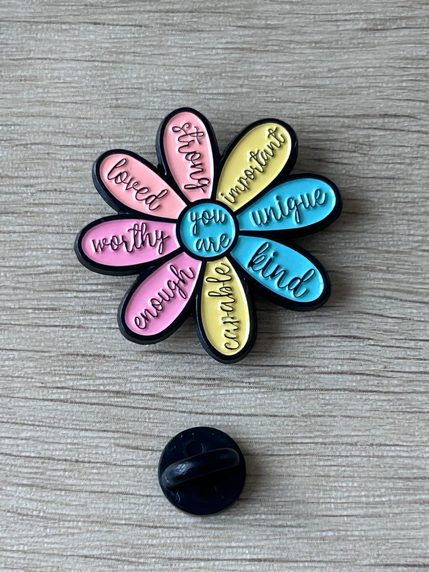 Pin's fleur « You Are...»