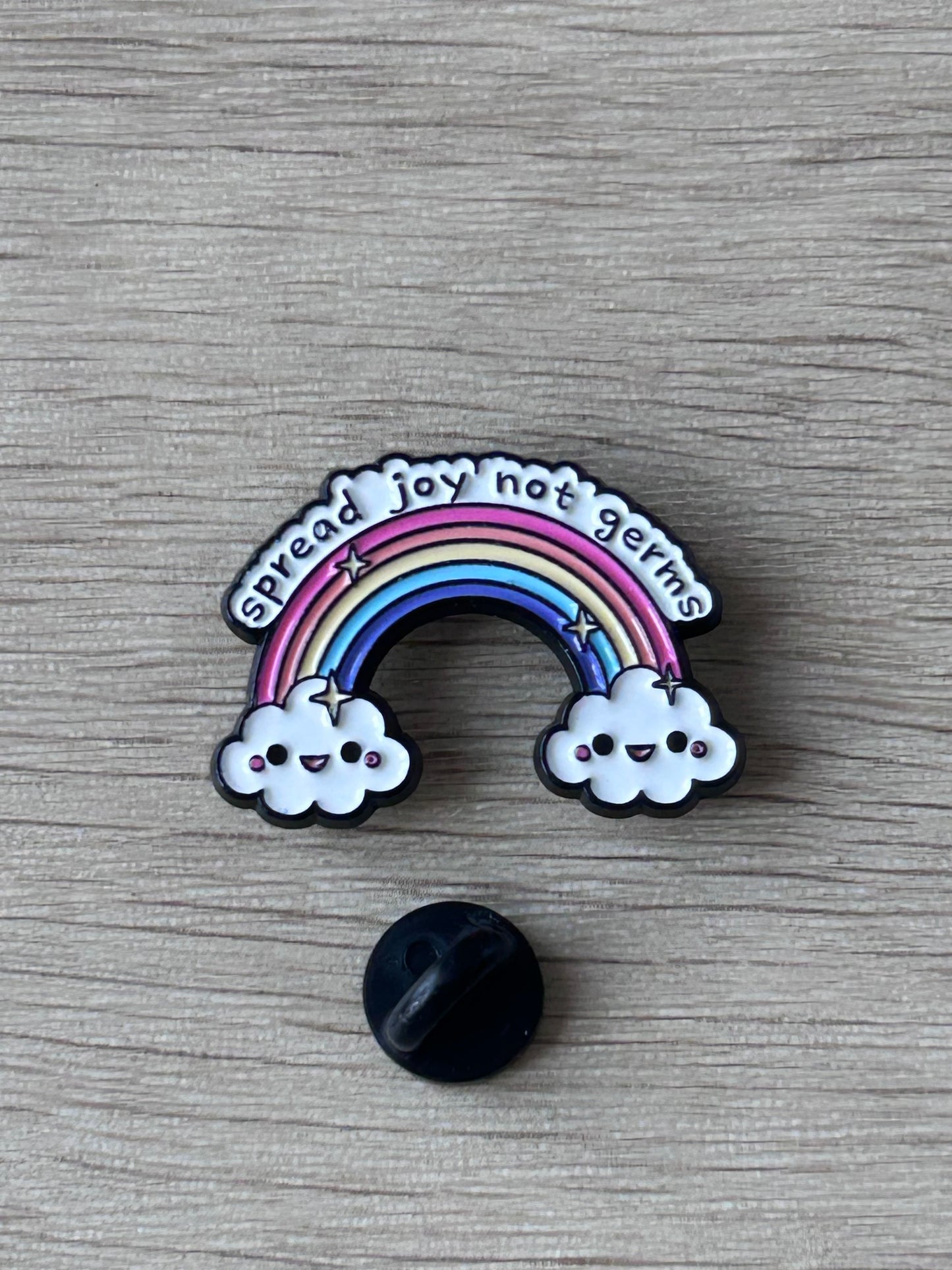 Pin's arc-en-ciel « Spread Joy Not Germs »