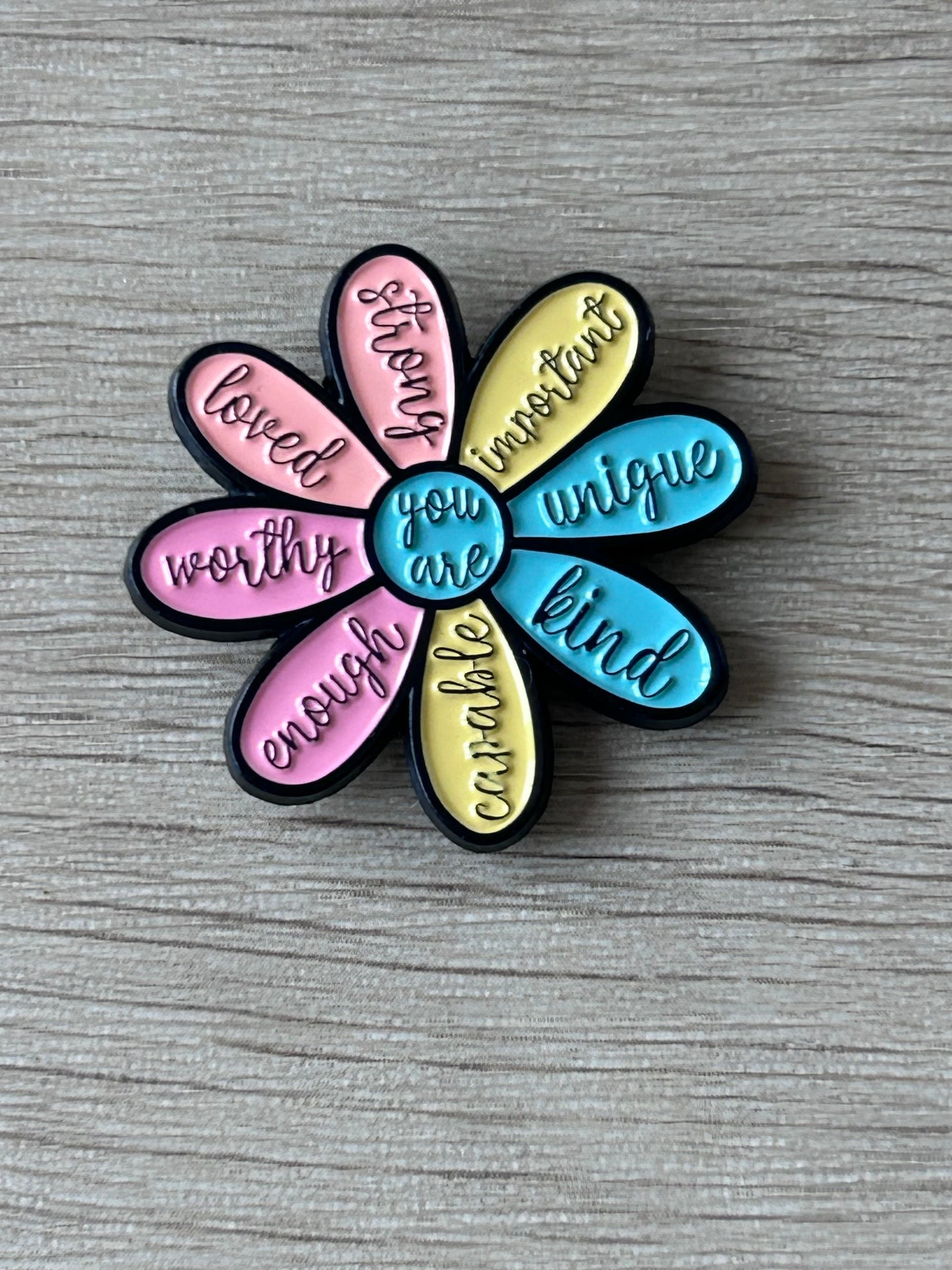 Pin's fleur « You Are...»