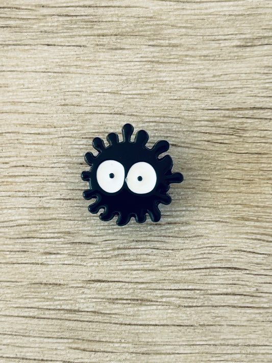 Épingle Noircillon noire avec yeux blancs