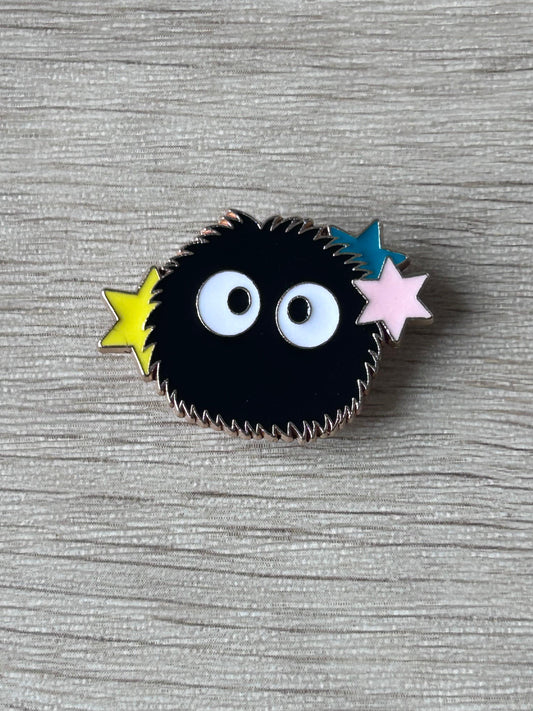 Pin's boule de suie étoilée