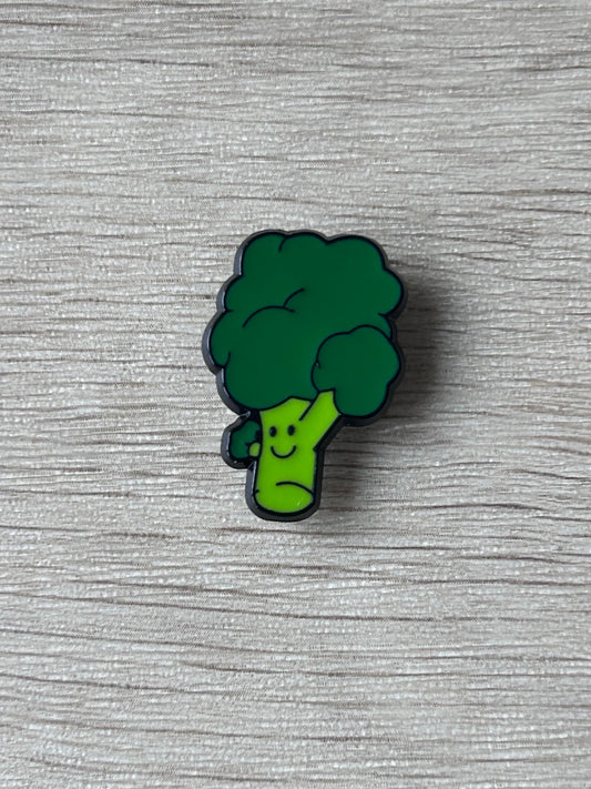 Broche en forme de brocoli vert souriant, visage jaune-vert