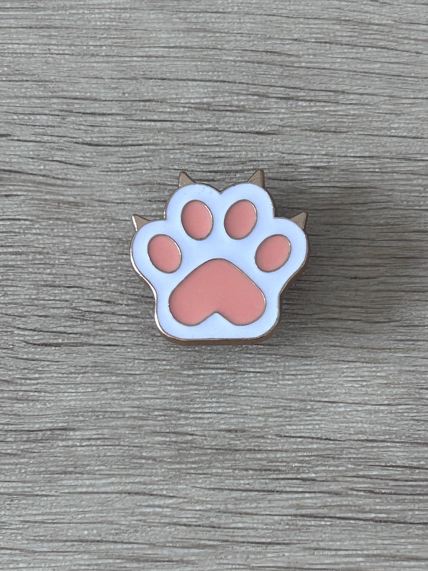 Épingle patte de chat émaillée bleu clair et rose, deux tiges métalliques