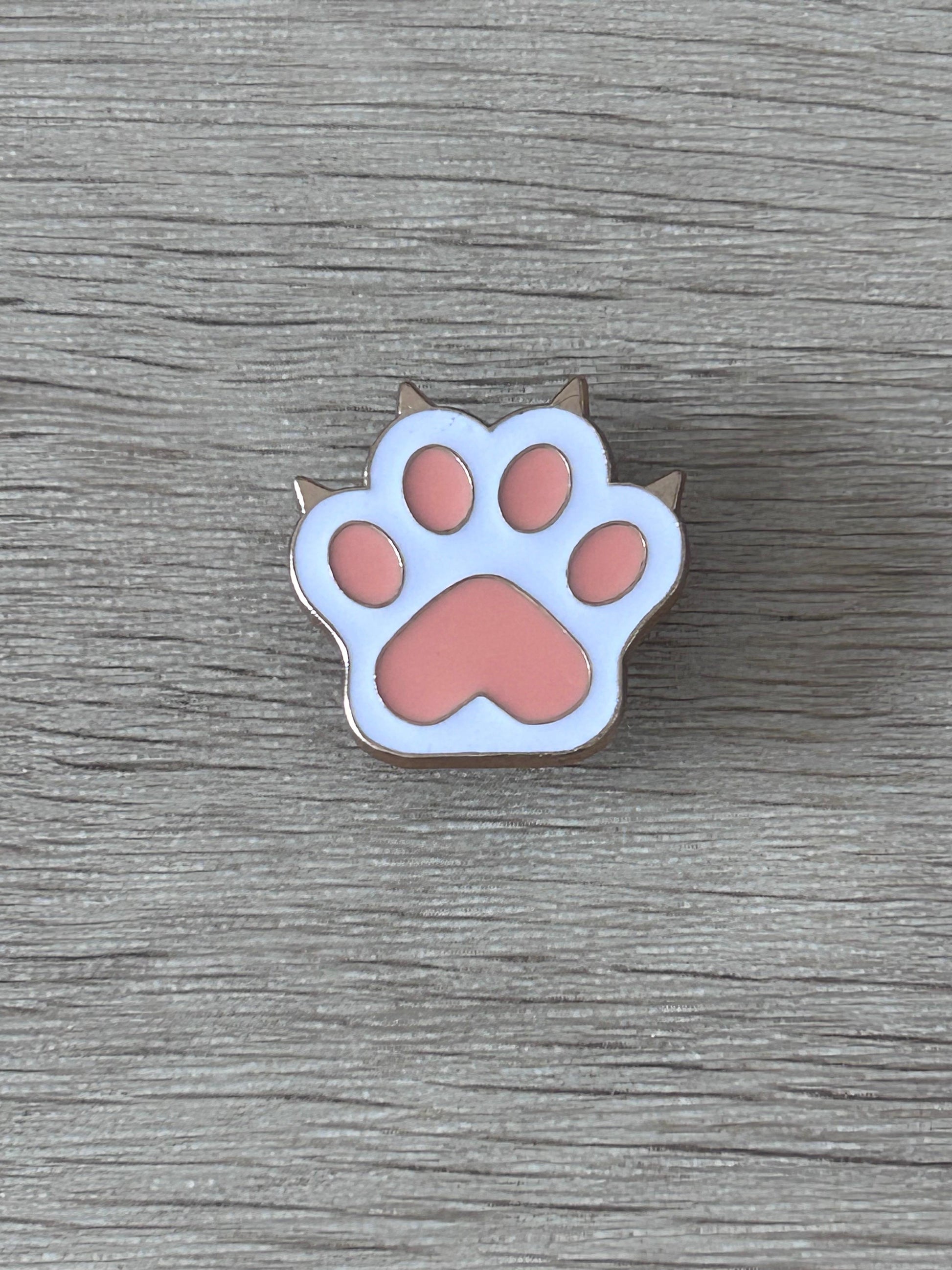 Épingle patte de chat émaillée bleu clair et rose, deux tiges métalliques