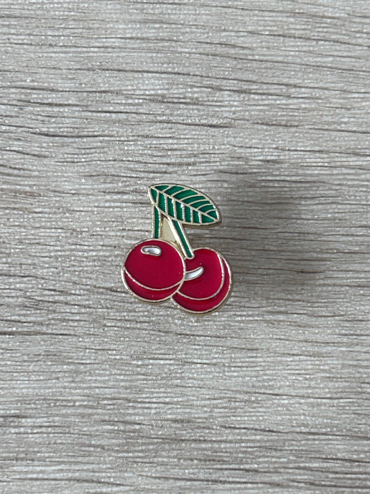 Broche cerises rouges avec feuille verte