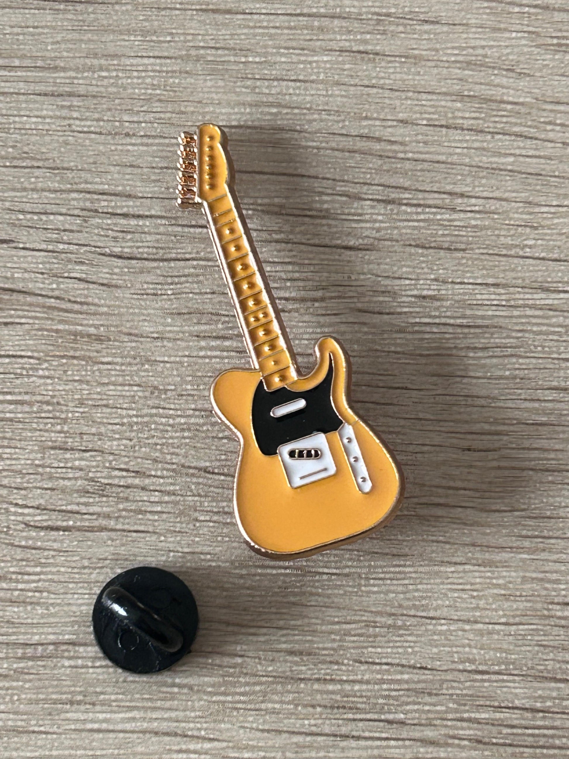 Épingle en forme de guitare électrique jaune avec support noir