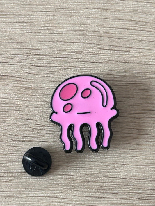 Pin en forme de méduse rose avec attache noire