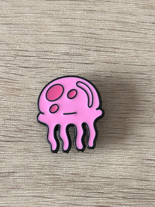 Pin en émail en forme de méduse rose, contours noirs